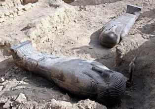 Two of three newly discovered sarcophagi at the Saqqara pyramids near Cairo March 2, 2005. Australian archaeologists have discovered one of the best preserved ancient Egyptian mummies dating from about 2,600 years ago, Zahi Hawass, the head of Egypt's Supreme Council for Antiquities said. REUTERS/Aladin Abdel Naby